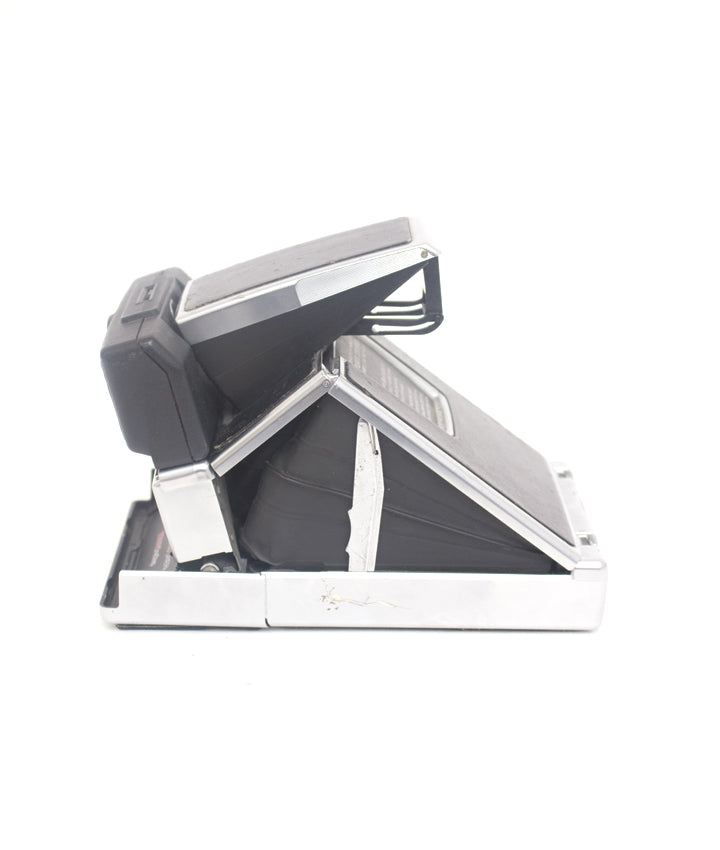 Polaroid SX-70 Sonar OneStep + 1000 display