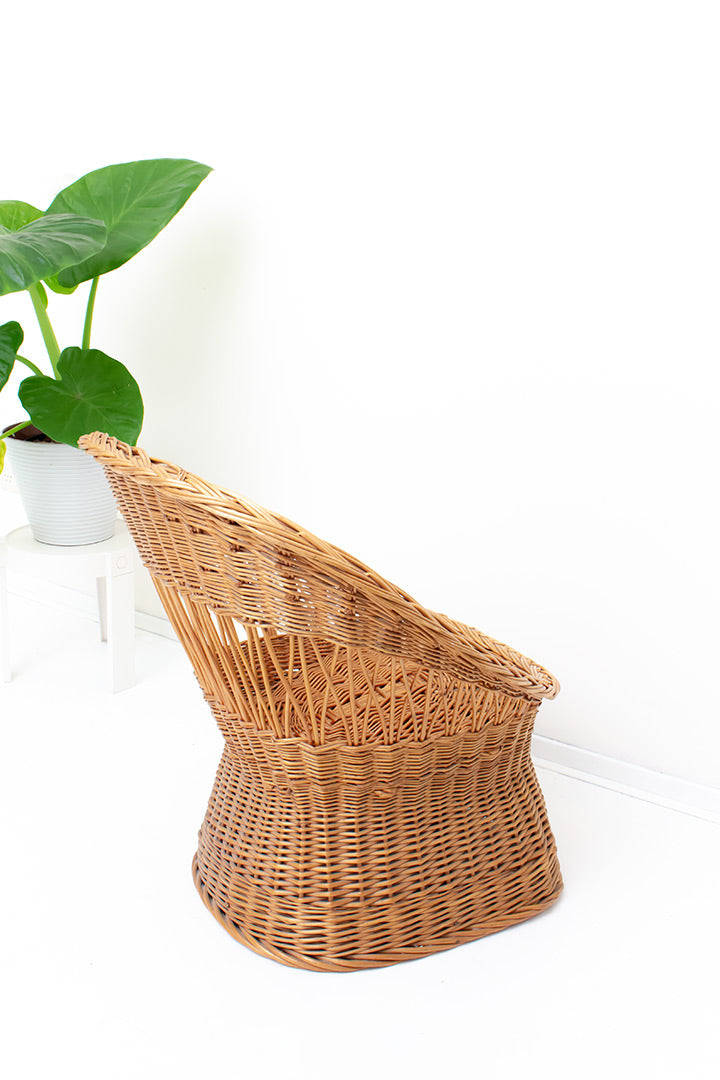Relaxte rotan stoel fauteuil met lage zit