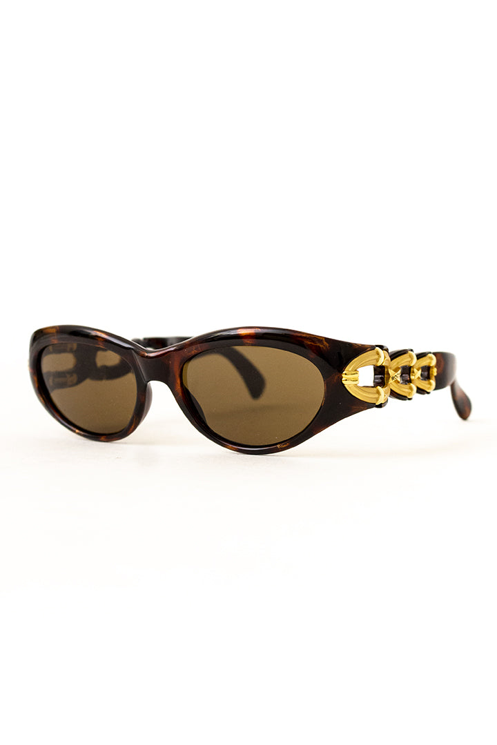 Rochas Paris vintage zonnebril met bruin gemêleerd montuur en goudkleurige chain