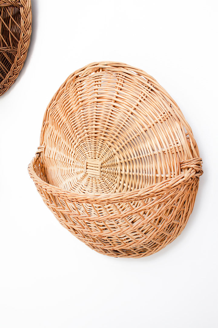 Ronde muurdecoratie van gevlochten rotan