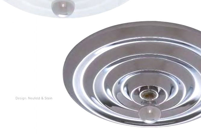 Deze mooie vintage ronde wandlamp draagt de naam Andro Wave en is ontworpen voor Sompex door Neufeld & Sein. De lamp is gemaakt van wit gelakt metaal