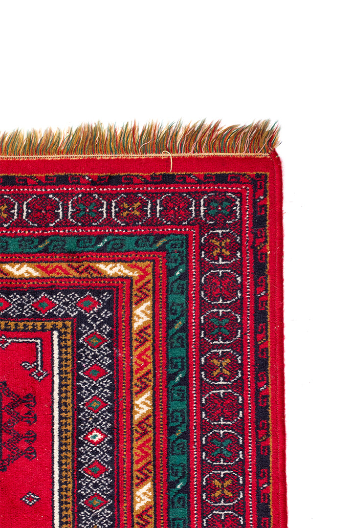 Rood tapijt met groen en bruin patroon 140x102 cm