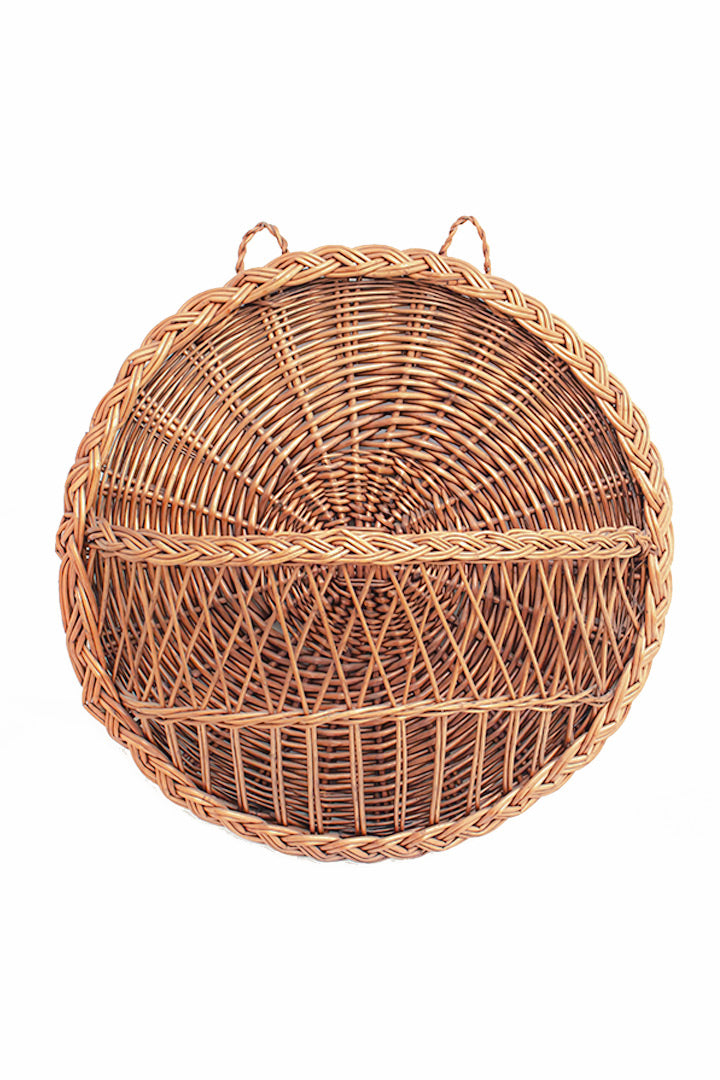 Rotan wanddecoratie voor planten of tijdschriften