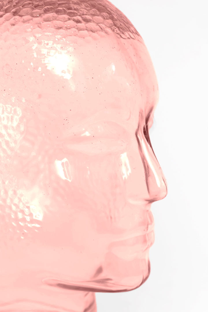 Roze 70s glazen beeld hoofd