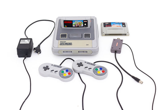 Super Nintendo SNES 1992 vintage Mario Kart en Road Runner 2 controllers coax aansluiting originele adapter