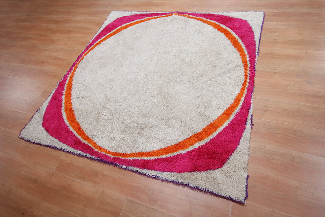 Vierkant vloerkleed hoogpolig jaren 60 in beige, roze, oranje en paars