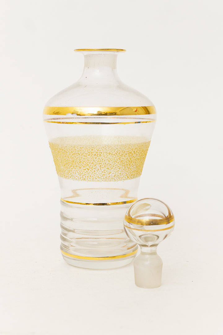 Vintage Franse karaf met 8 shotglaasjes goud gestreept
