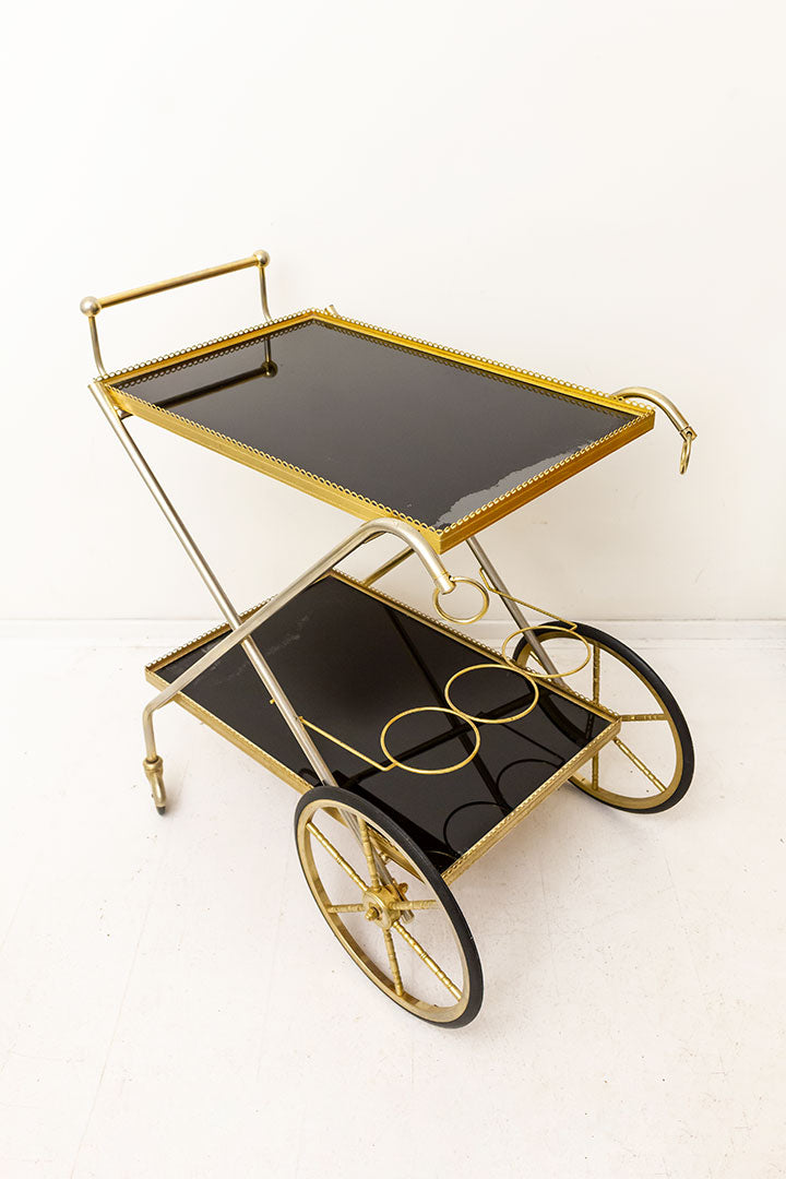 Vintage Hollywood Regency messing barcart/serveerwagen met zwarte glazen platen