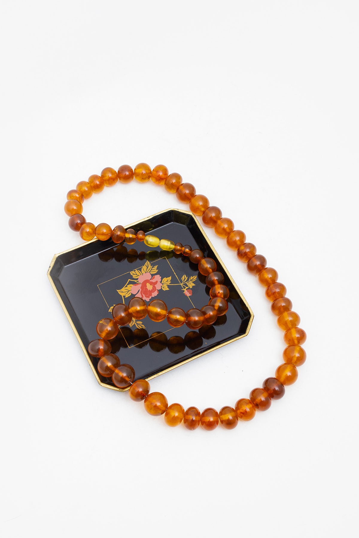 Vintage amber kralenketting met witte amber sluiting