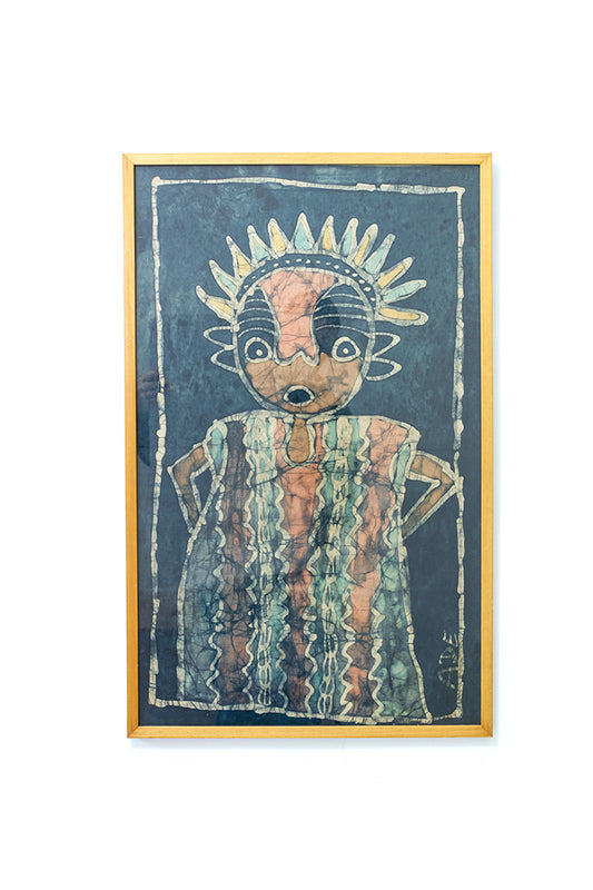 Vintage batik doek met vrolijk figuur ingelijst in hout