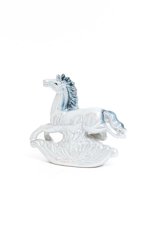 Vintage beeld van een springend paard blauw holografisch