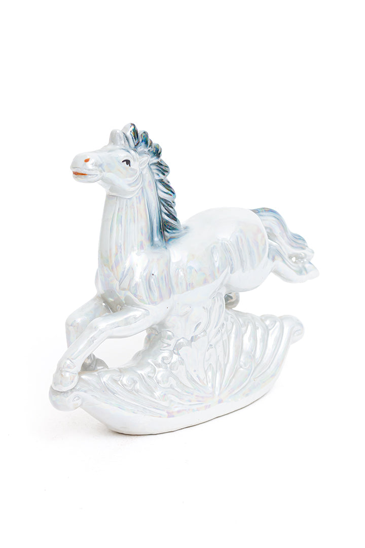 Vintage beeld van een springend paard blauw holografisch