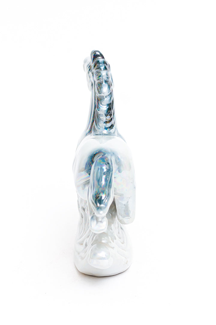 Vintage beeld van een springend paard blauw holografisch