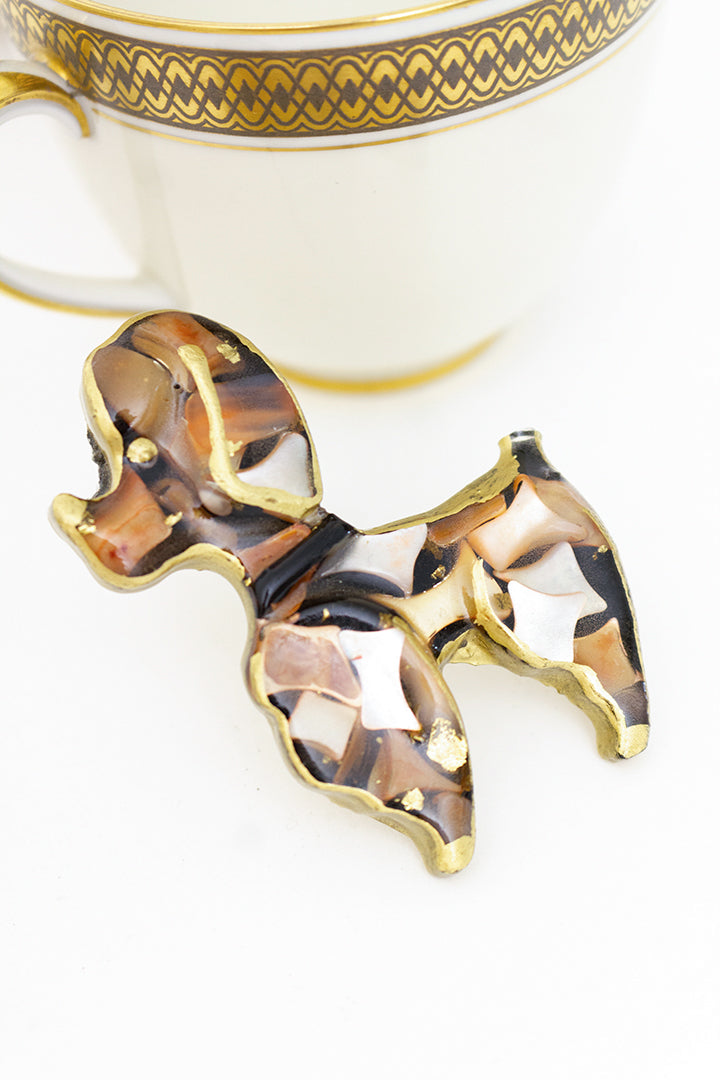 Vintage broche poedel goudkleurig met parelmoer