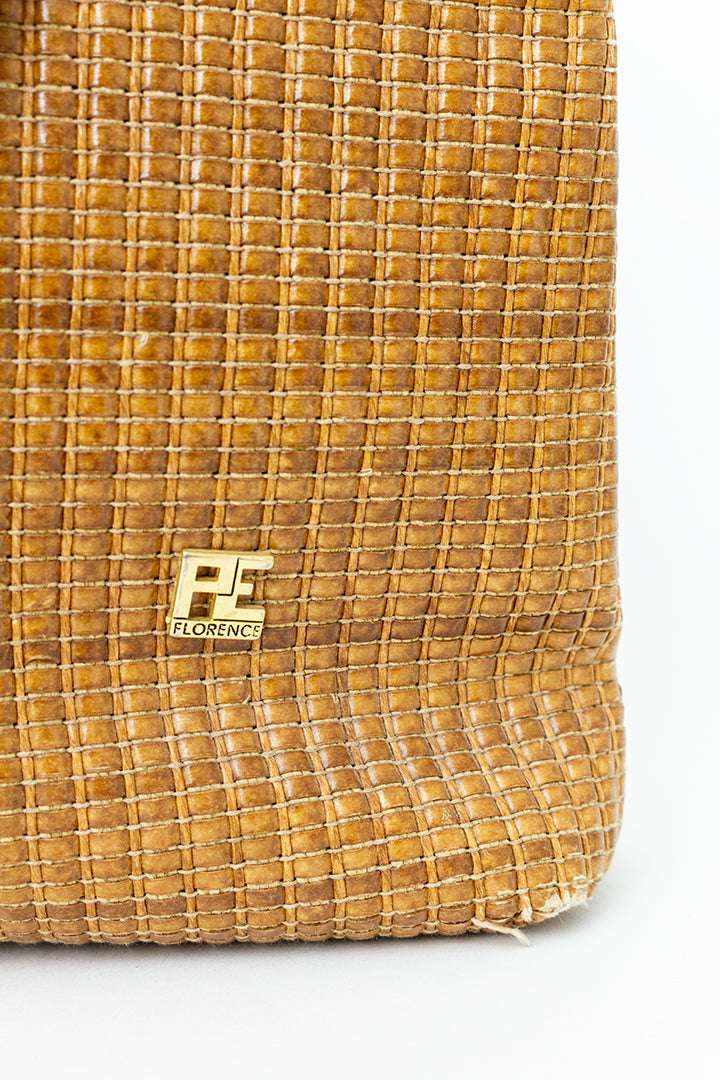 Vintage bruine schoudertas met riet-look en hengsels van touw