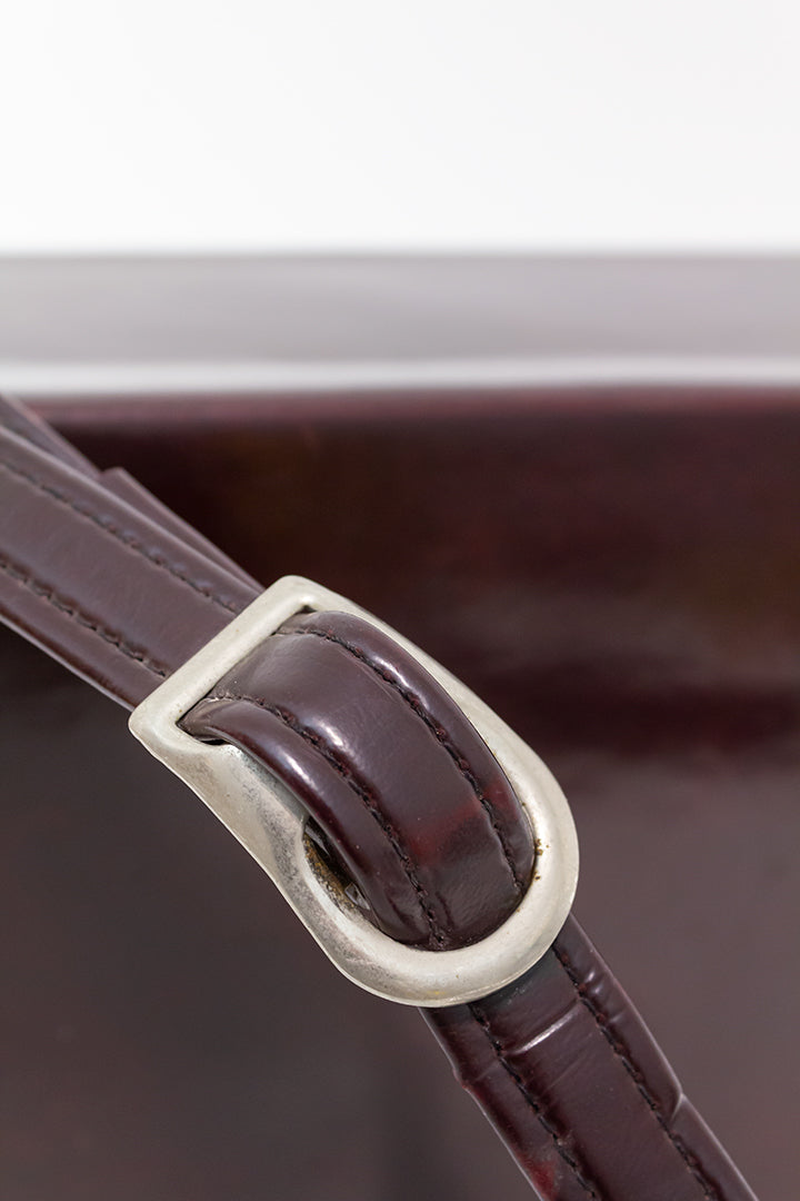 Vintage cameratas van donkerbruin skai-leer met zilverkleurige gesp