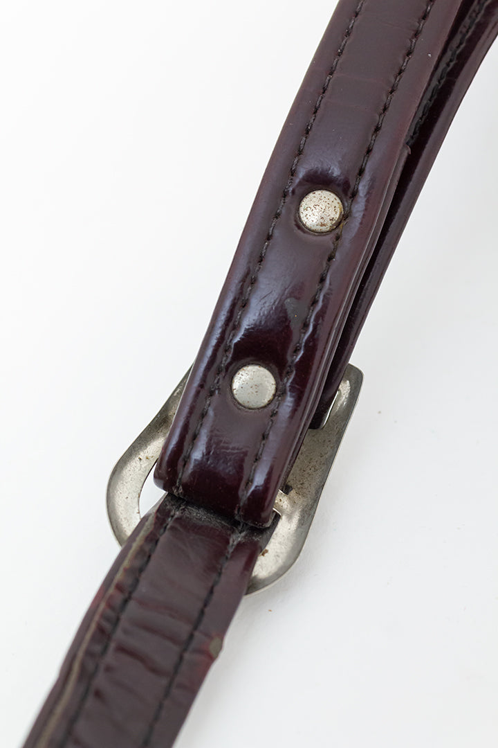 Vintage cameratas van donkerbruin skai-leer met zilverkleurige gesp