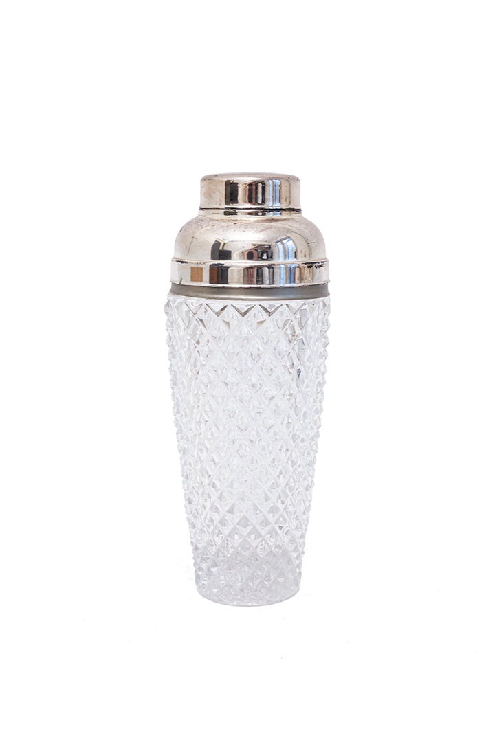 Vintage cocktail shaker van kristalglas met zilverkleurige dop