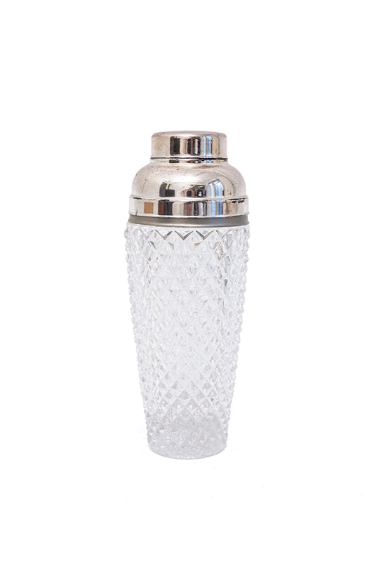 Vintage cocktail shaker van kristalglas met zilverkleurige dop