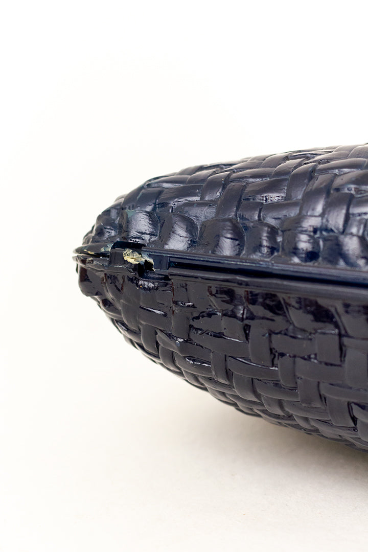 Vintage donkerblauwe clutch met geweven textuur Monella