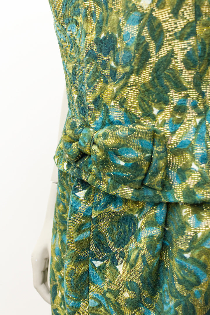 Vintage feestjurk groen/goud met strik in de taille