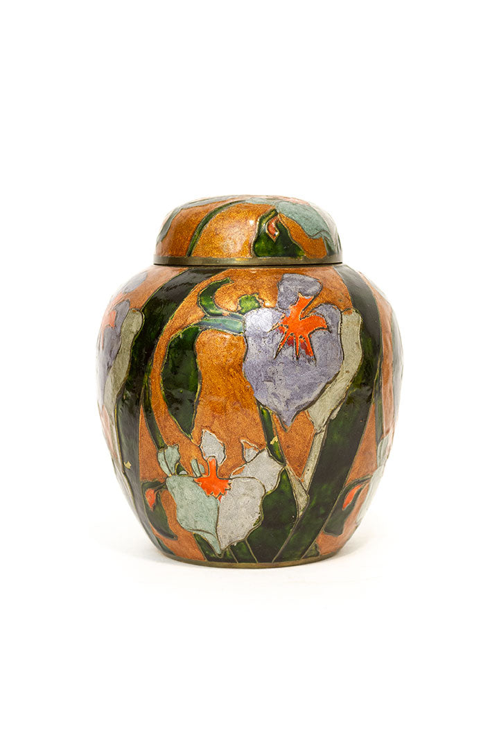 Vintage geëmailleerde oranje gemberpot met orchideeën
