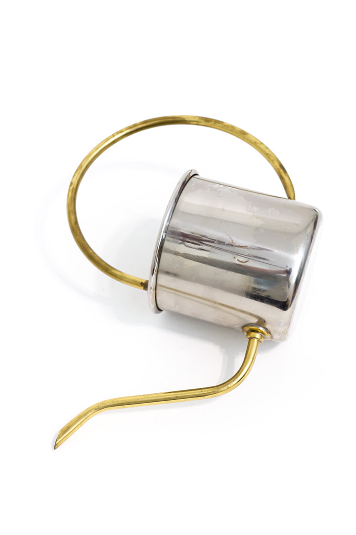 Vintage gieter messing en metaal