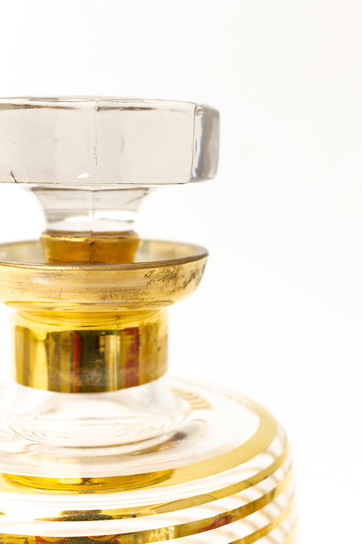 Vintage glazen karaf met gouden strepen en dop
