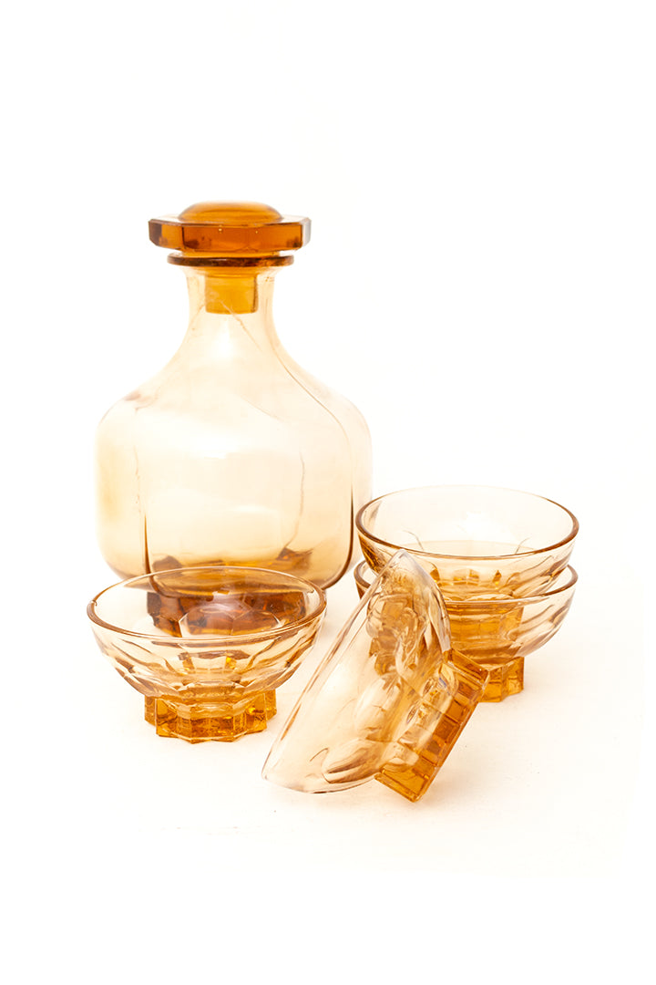 Vintage glazen roze karaf met 4 drankglaasjes