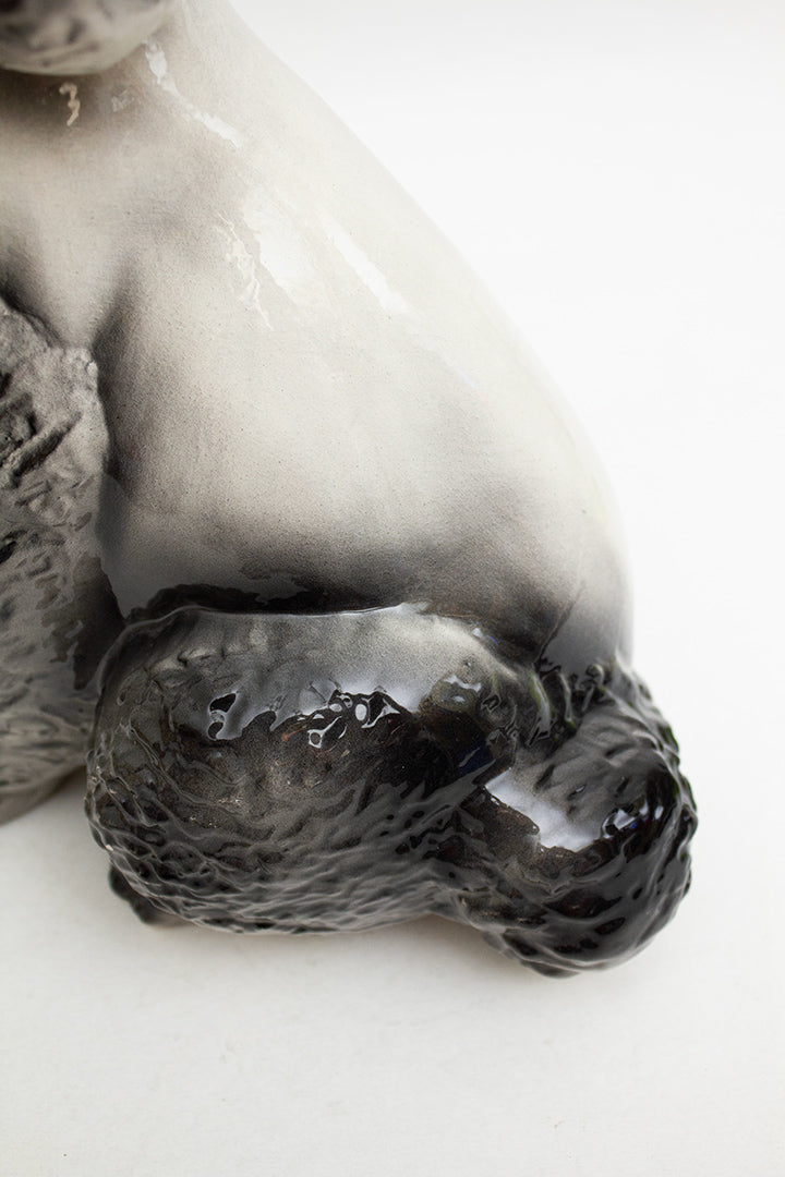 Vintage grijs poedel beeld