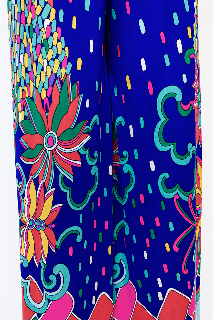 Vintage jumpsuit kobaltblauw met kleurrijke print jaren 70