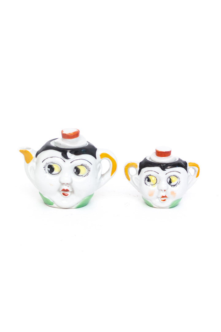 Vintage kinderservies met gezichtjes en googly eyes jaren 20 art deco