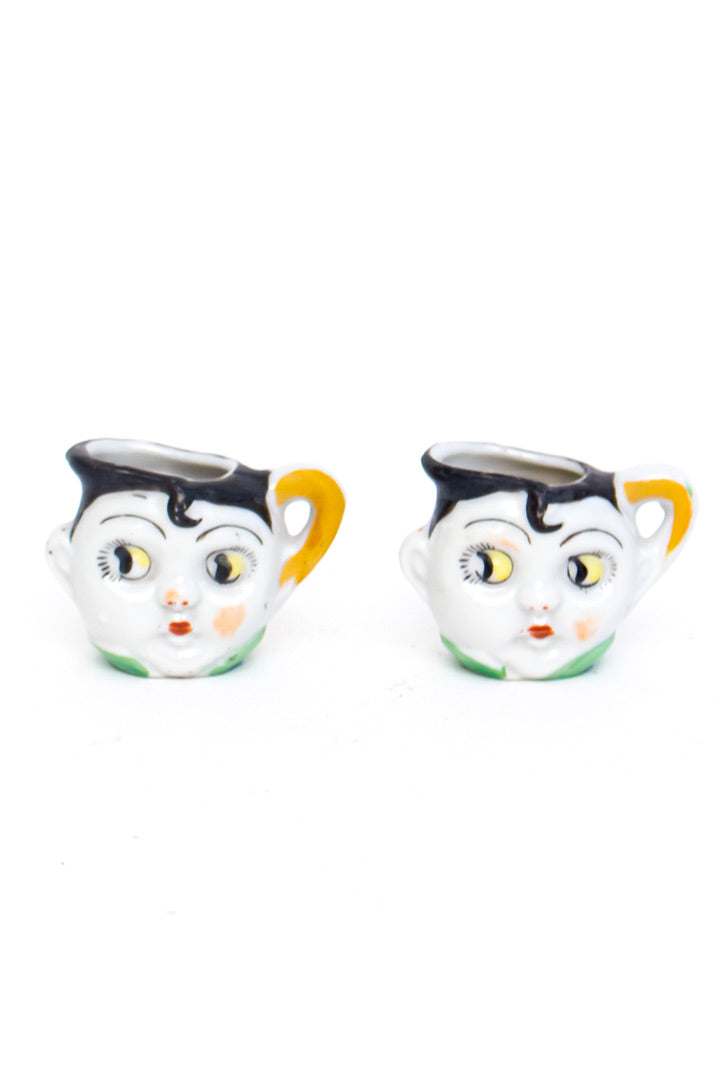 Vintage kinderservies met gezichtjes en googly eyes jaren 20 art deco