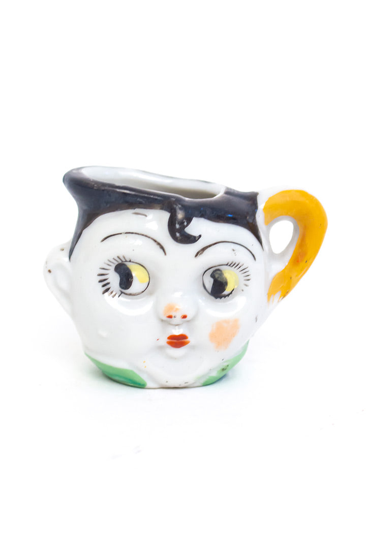Vintage kinderservies met gezichtjes en googly eyes jaren 20 art deco