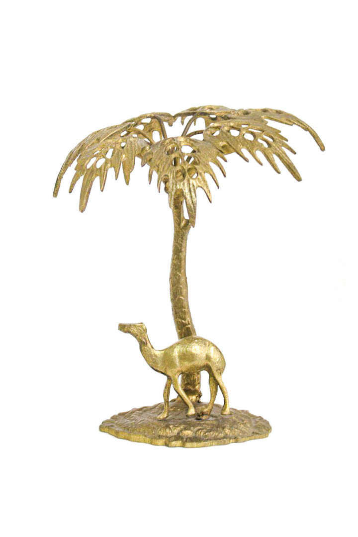 Vintage messing eiland met palmboom en dromedaris