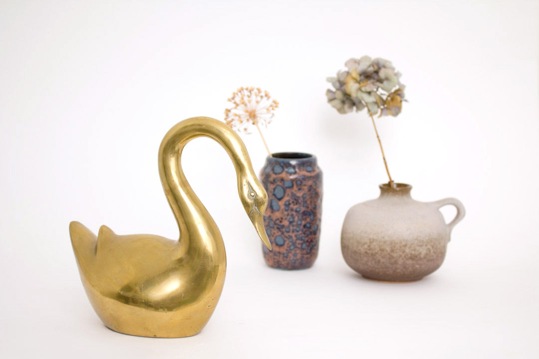 Vintage messing zwaan met gebogen hals