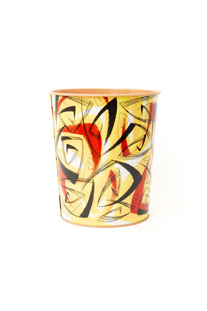 Vintage metalen prullenbak met abstracte print geel/rood/zwart