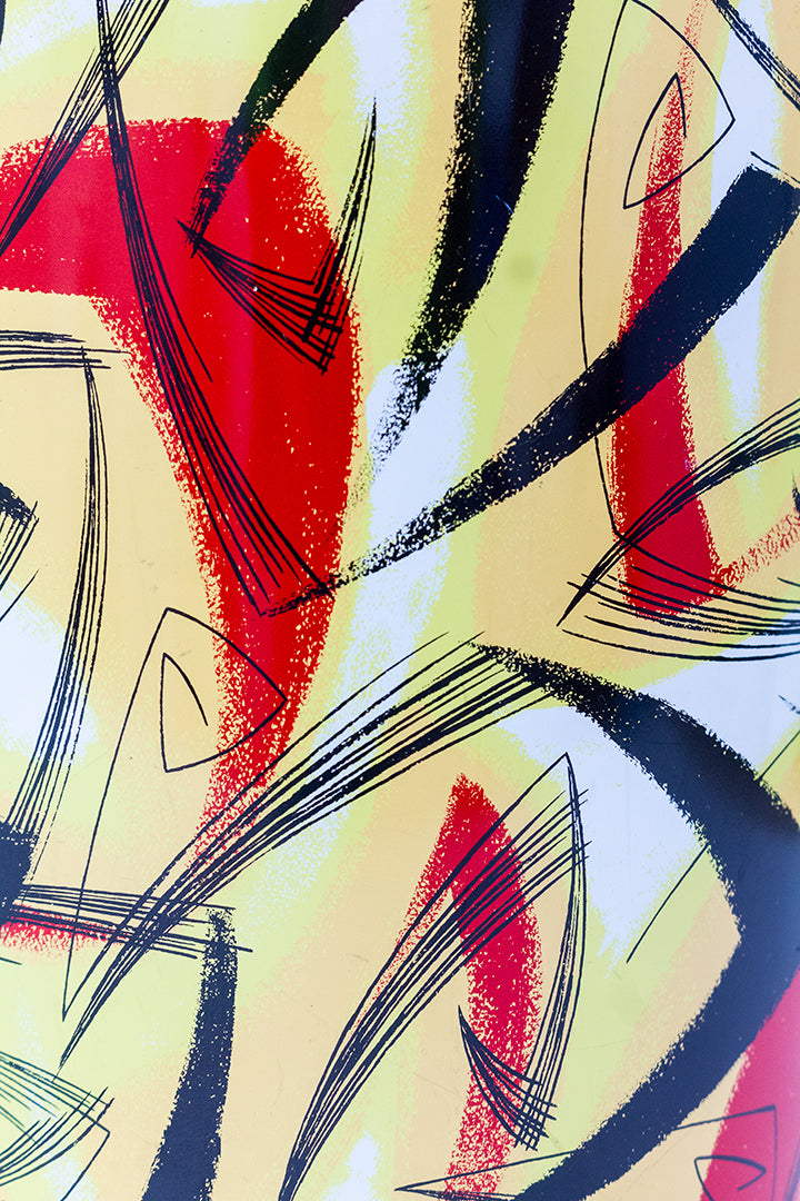 Vintage metalen prullenbak met abstracte print geel/rood/zwart