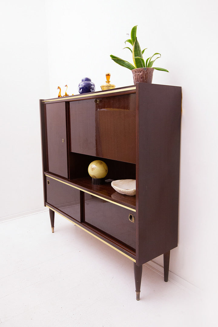 Vintage gelakt palissander highboard met messing biezen