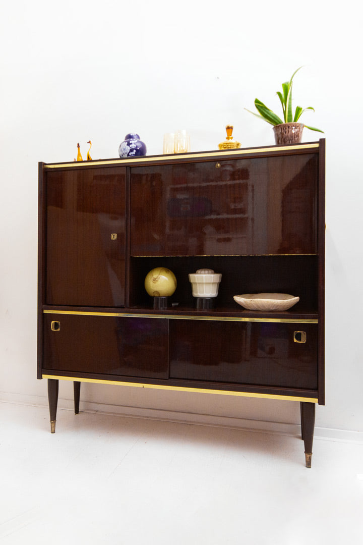 Vintage gelakt palissander highboard met messing biezen