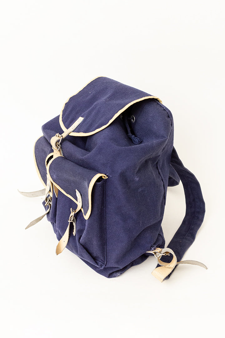 Vintage rugzak van donkerblauw katoen met leren details