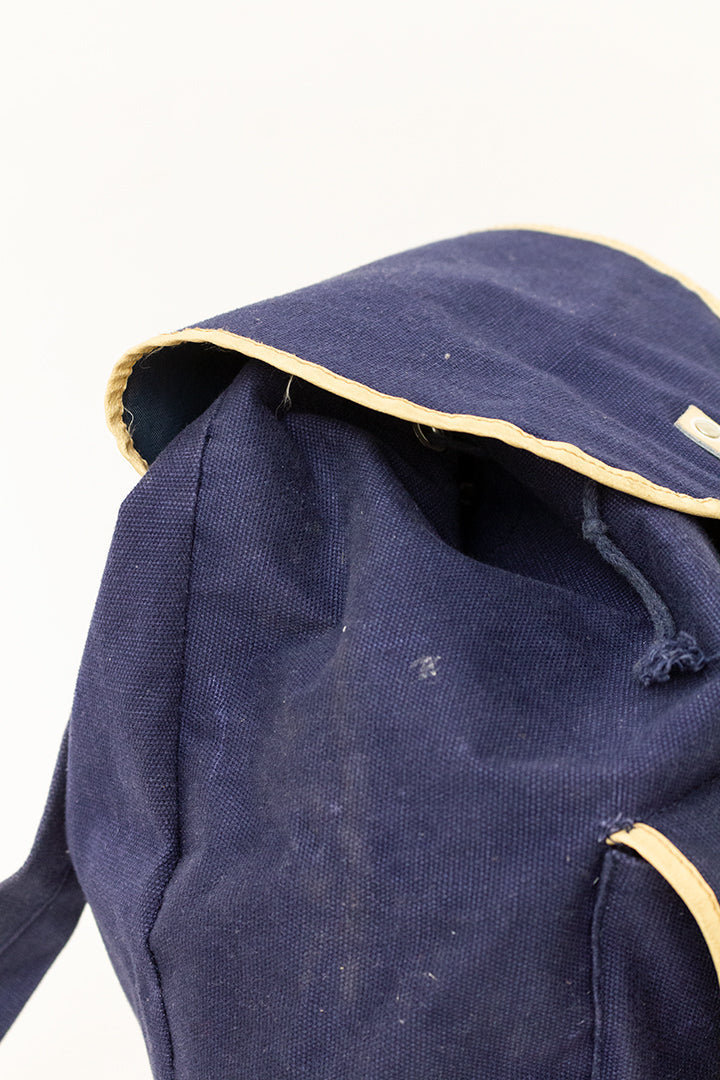 Vintage rugzak van donkerblauw katoen met leren details