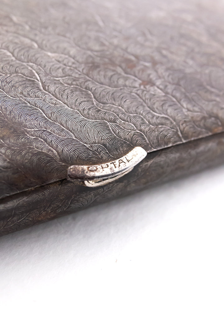 Vintage sigarenhouder van metaal met golvend patroon