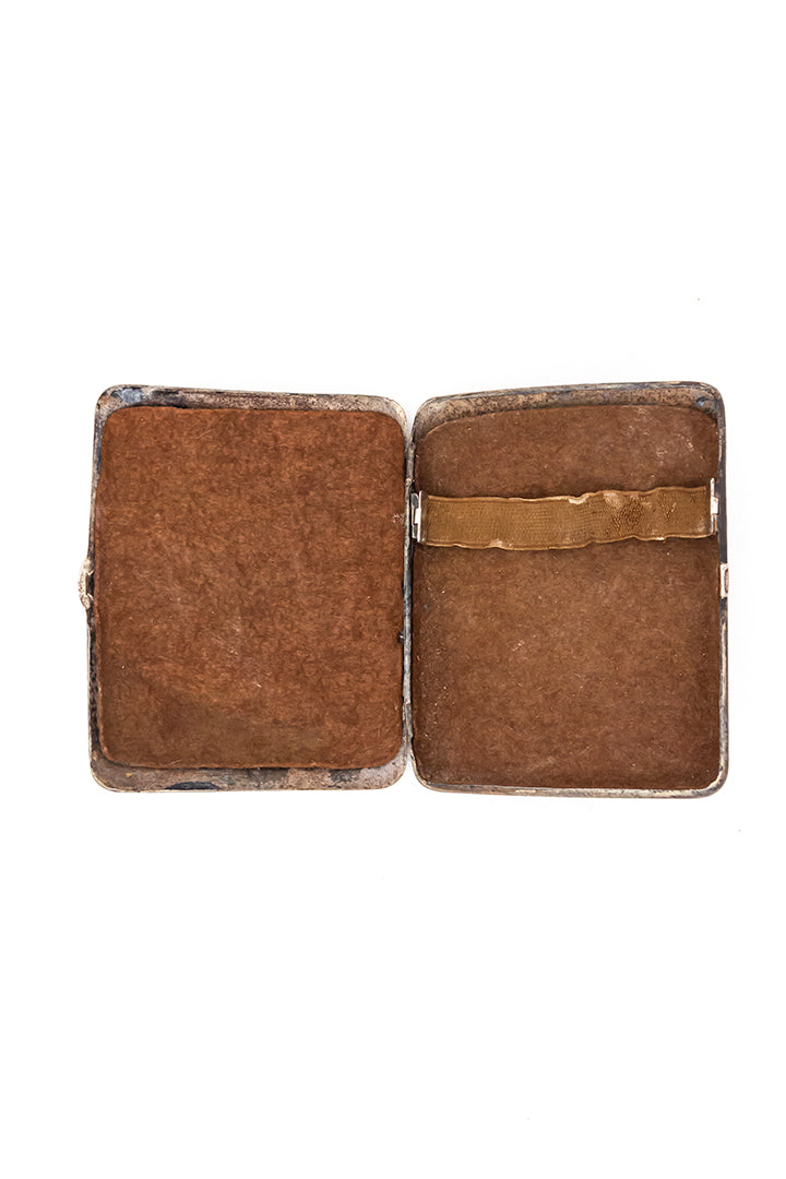 Vintage sigarenhouder van metaal met golvend patroon