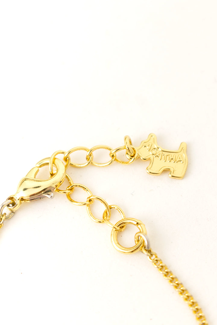Vintage vergulde schakelarmband met hondje Agatha Paris