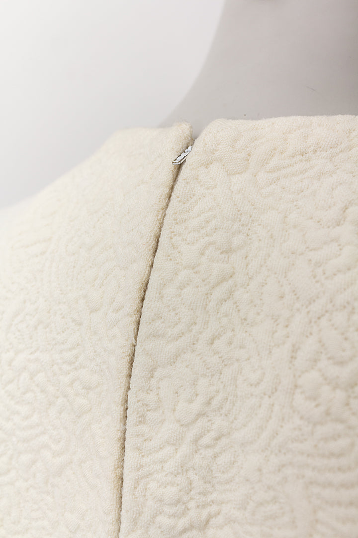 Vintage wollen jurk crèmekleurig met swirl-patroon