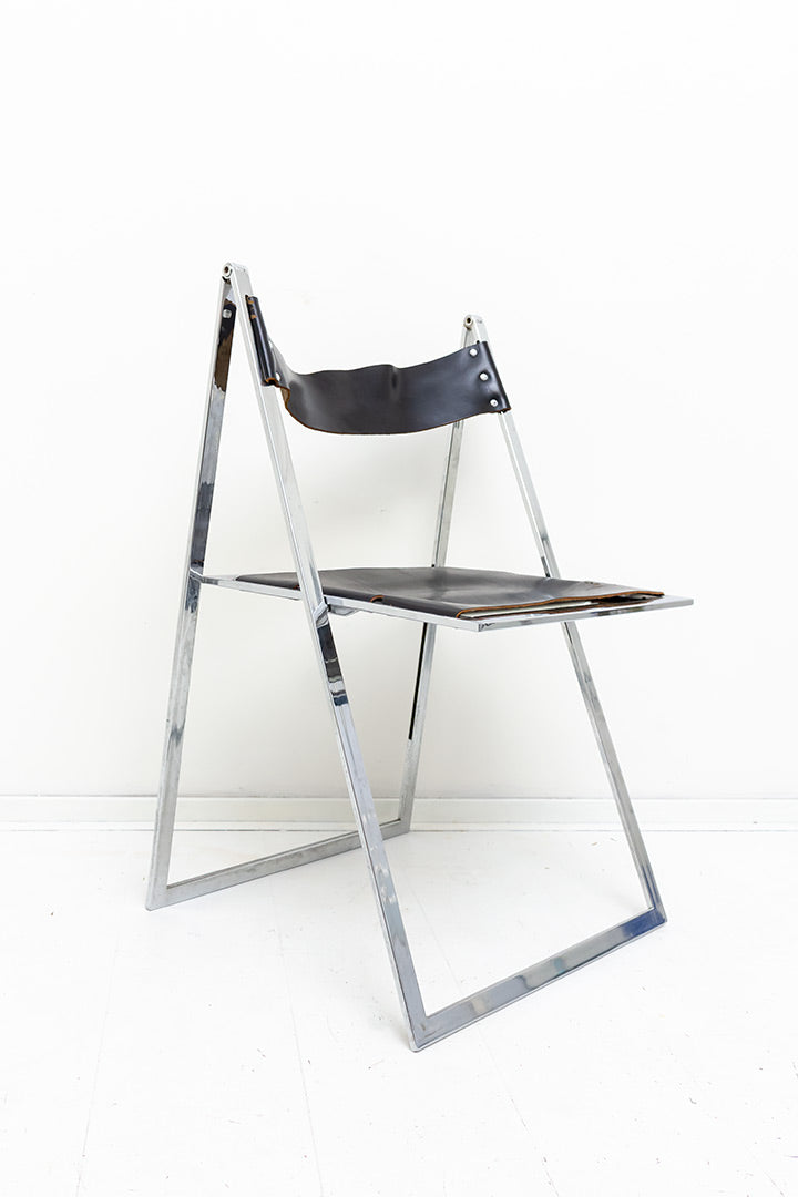 Vono Lübke vintage klapstoel met verchroomd frame en zwarte leren zitting