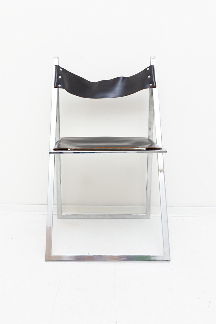 Vono Lübke vintage klapstoel met verchroomd frame en zwarte leren zitting