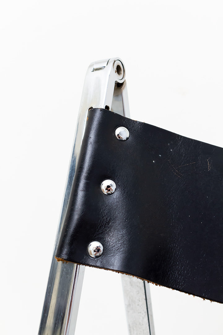 Vono Lübke vintage klapstoel met verchroomd frame en zwarte leren zitting