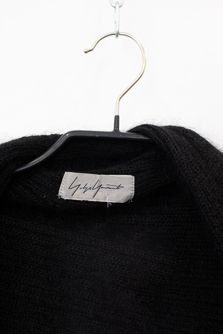 Yohji Yamamoto gebreide cape met asymmetrische mouwen